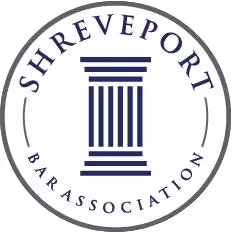 Seal of Shreveport Bar Association featuring a stylized column in navy blue.